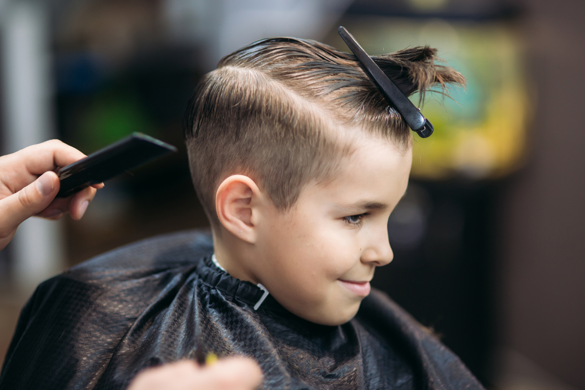 Boy Having Haircut on Barbershop